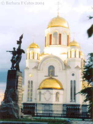 Komsomol Monument with new Ascension Church in summer